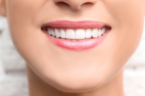 young woman smiling close-up